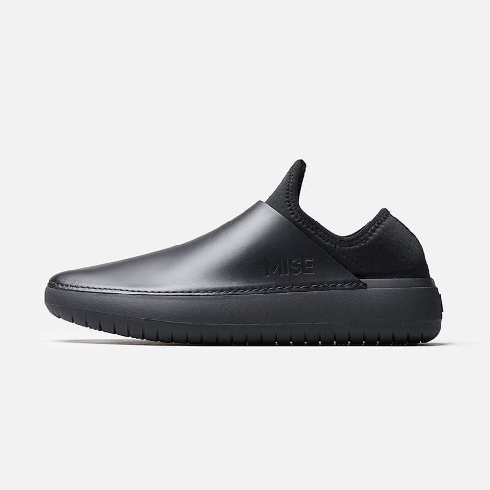Mise non-slip black leather shoes with removable insoles.